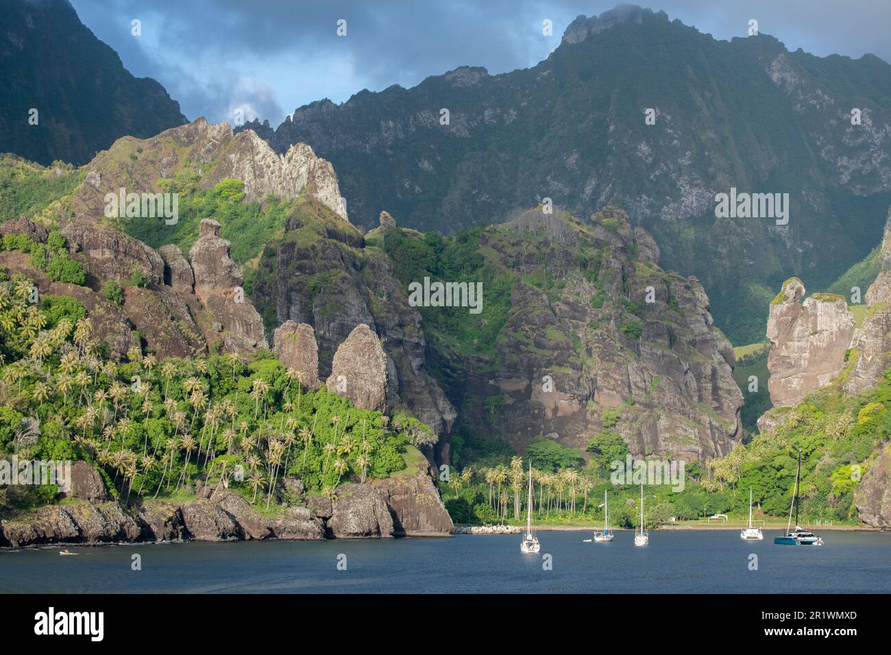French Polynesia, Southern Marquesas, Hana Vave, Bay of Virgins. Dramatic coastal view of bay with The Virgins rock formation. Stock Photo