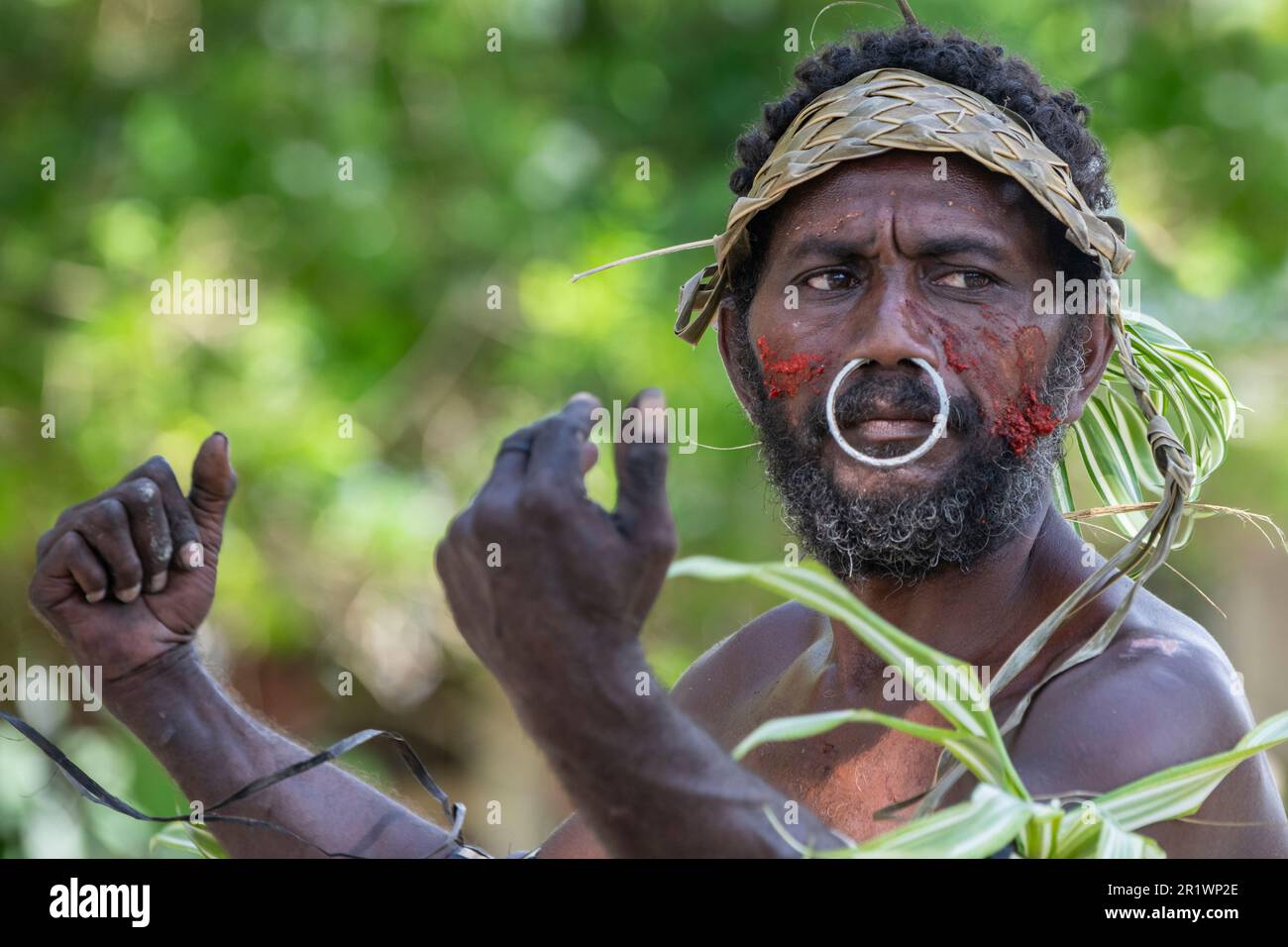 New Georgia Islands, Solomon Islands, Marovo Lagoon, Mbili Island, Mbili Village. Welcome dance, warrior dance performed by village boys and men. Stock Photo