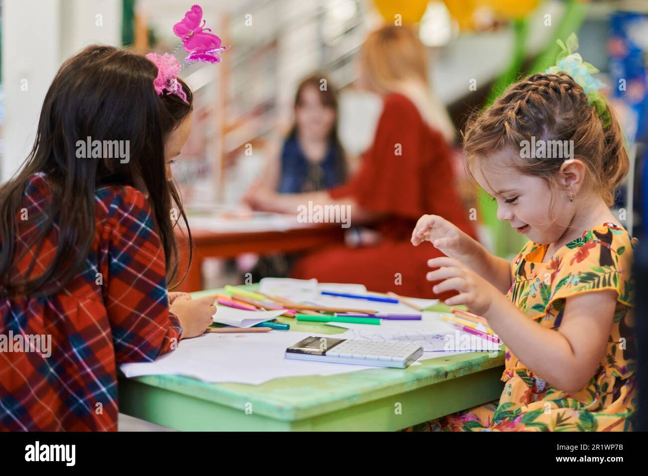 Creative kids during an art class in a daycare center or elementary ...