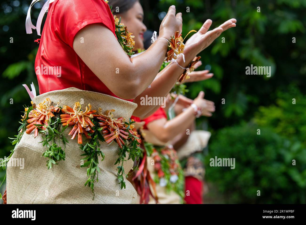 Kingdom of Tonga, Neiafu. Traditional welcome dancers in typical taʻovala, woven mat skirt worn by both men and women. Stock Photo