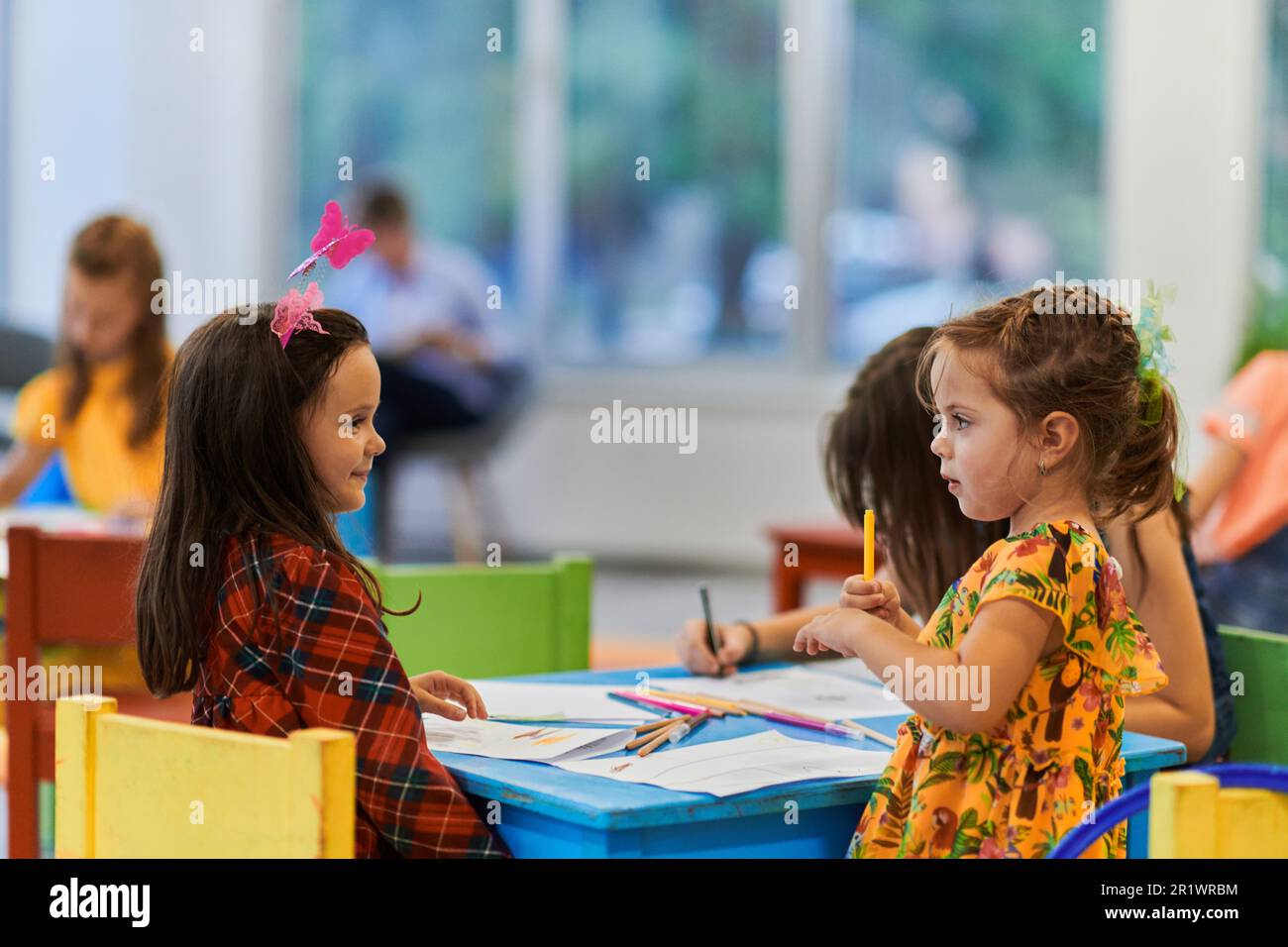 Creative kids during an art class in a daycare center or elementary ...