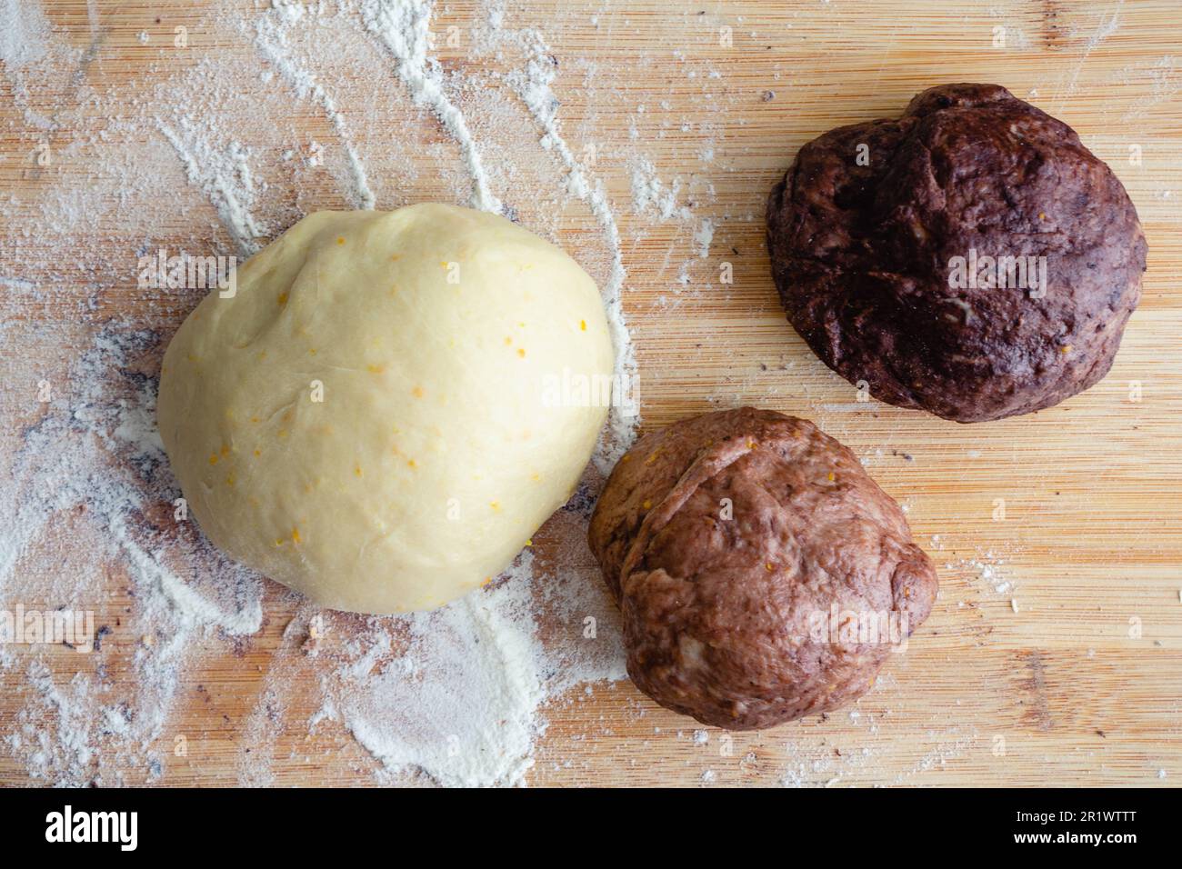 Three Colors of Milk Bread Dough Formed into Balls Bread dough that