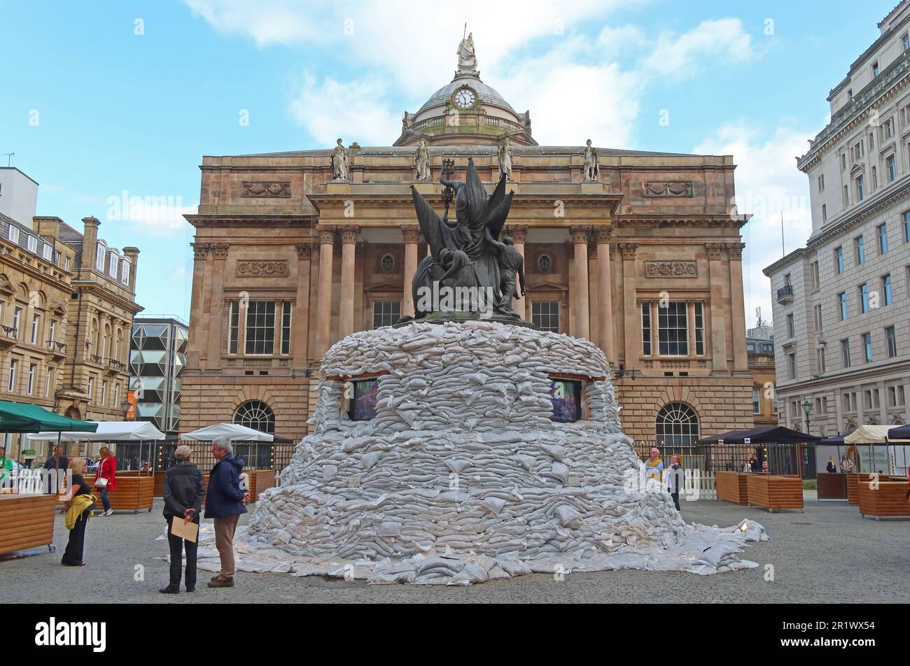 The Nelson Monument, in Exchange Flags square, protected like monuments in Ukraine, with 2500 sandbags - Merseyside, England, UK, L2 3YL Stock Photo