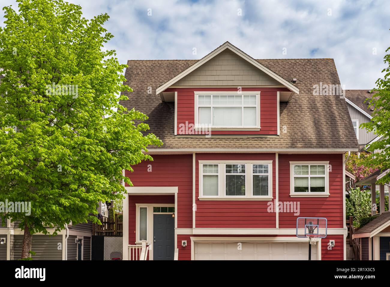 Houses in suburb in the north America. Top of a house with nice windows