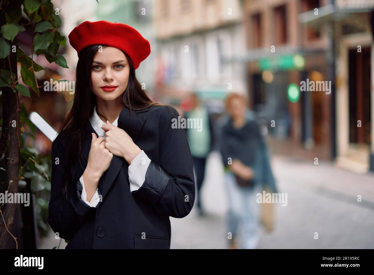 Woman walking down an old city street in a crowd, sociophobia, fear of