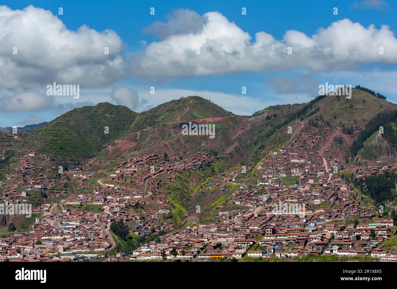 Steep mountains surrounding Cusco in Peru being converted into housing subdivisions. Stock Photo