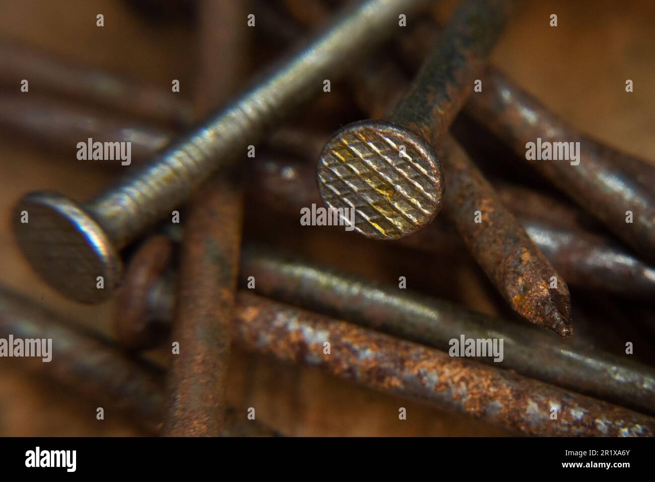 old rusty, 16 penny nails, pile of heavy penny nails for construction