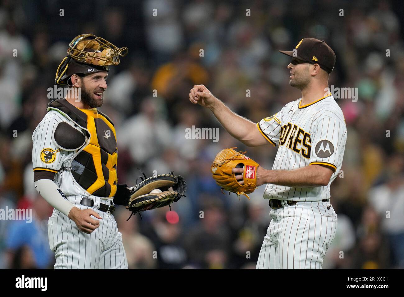 San Diego Padres relief pitcher Nick Martinez, right, celebrates with  catcher Austin Nola after the Padres defeated the Kansas City Royals 4-0 in  a baseball game Monday, May 15, 2023, in San