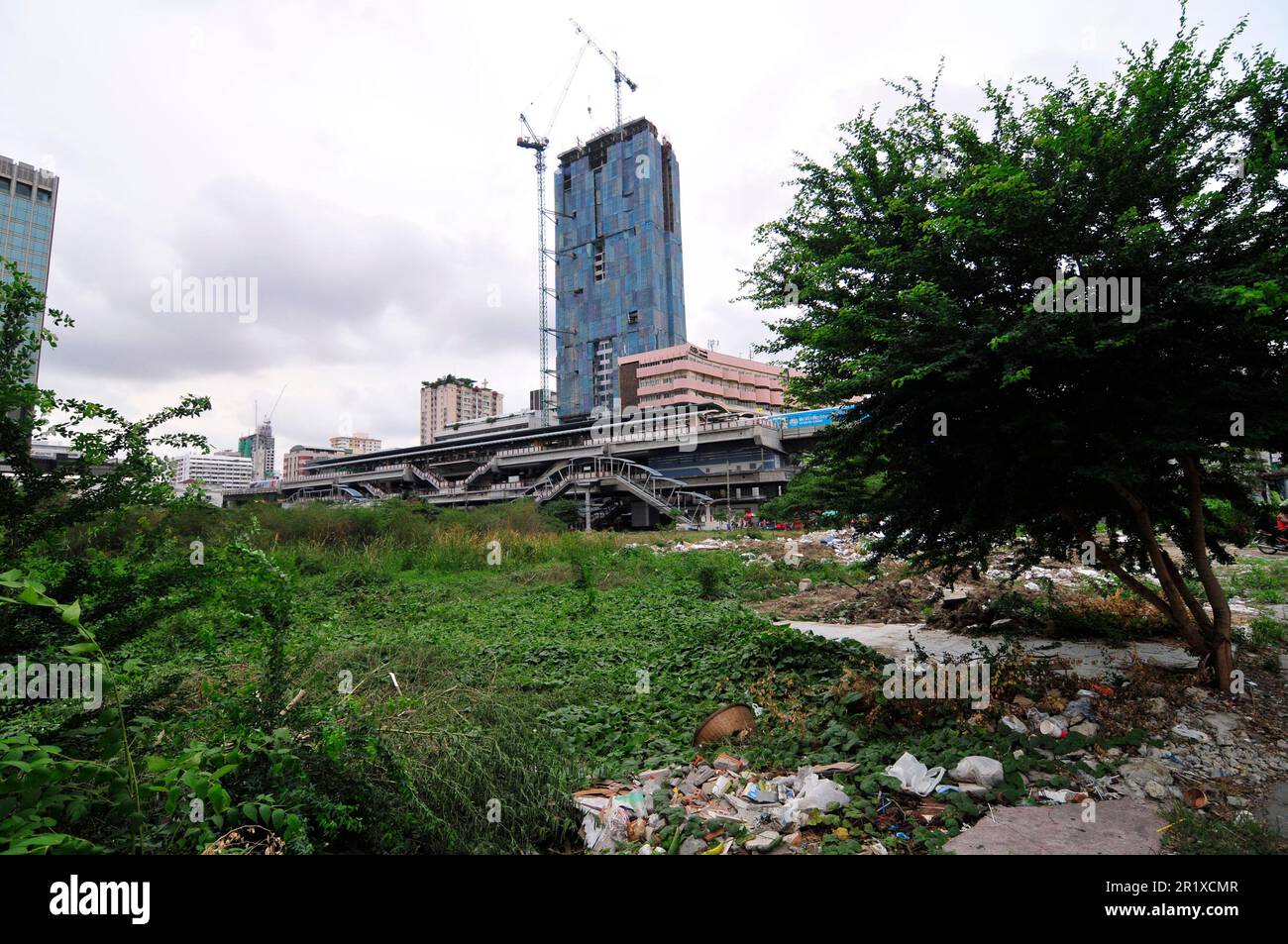 Empty large plot of land on the corner of Phetchaburi Road and Phaya  Thai Road before construction of the Summit Tower in Bangkok, Thailand. Stock Photo