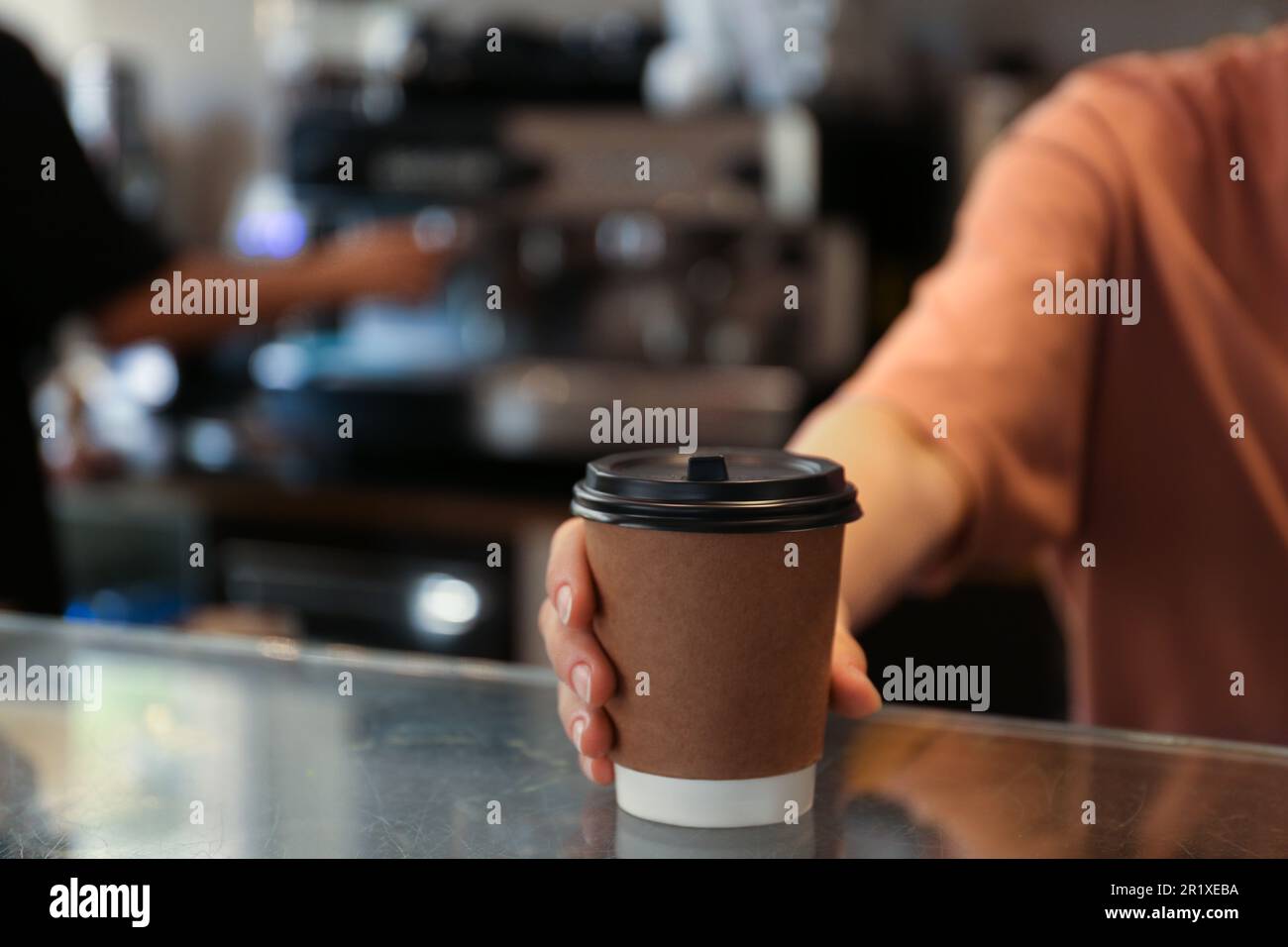 Barista putting takeaway coffee cup hi-res stock photography and images ...