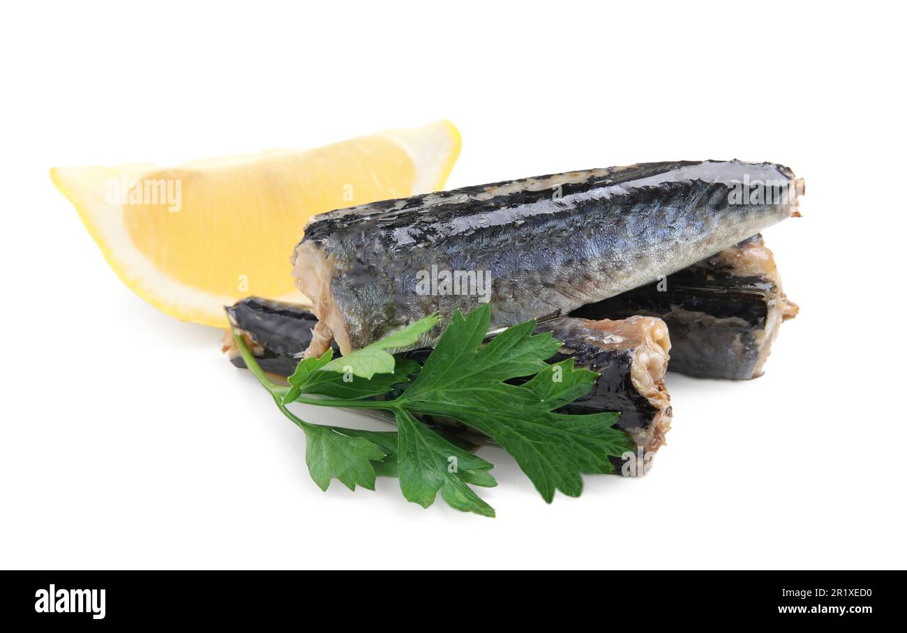 Canned mackerel fillets with parsley and lemon on white background