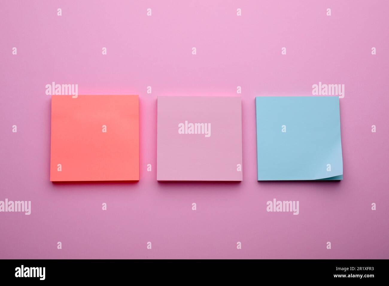 Paper notes on pale pink background, flat lay Stock Photo - Alamy