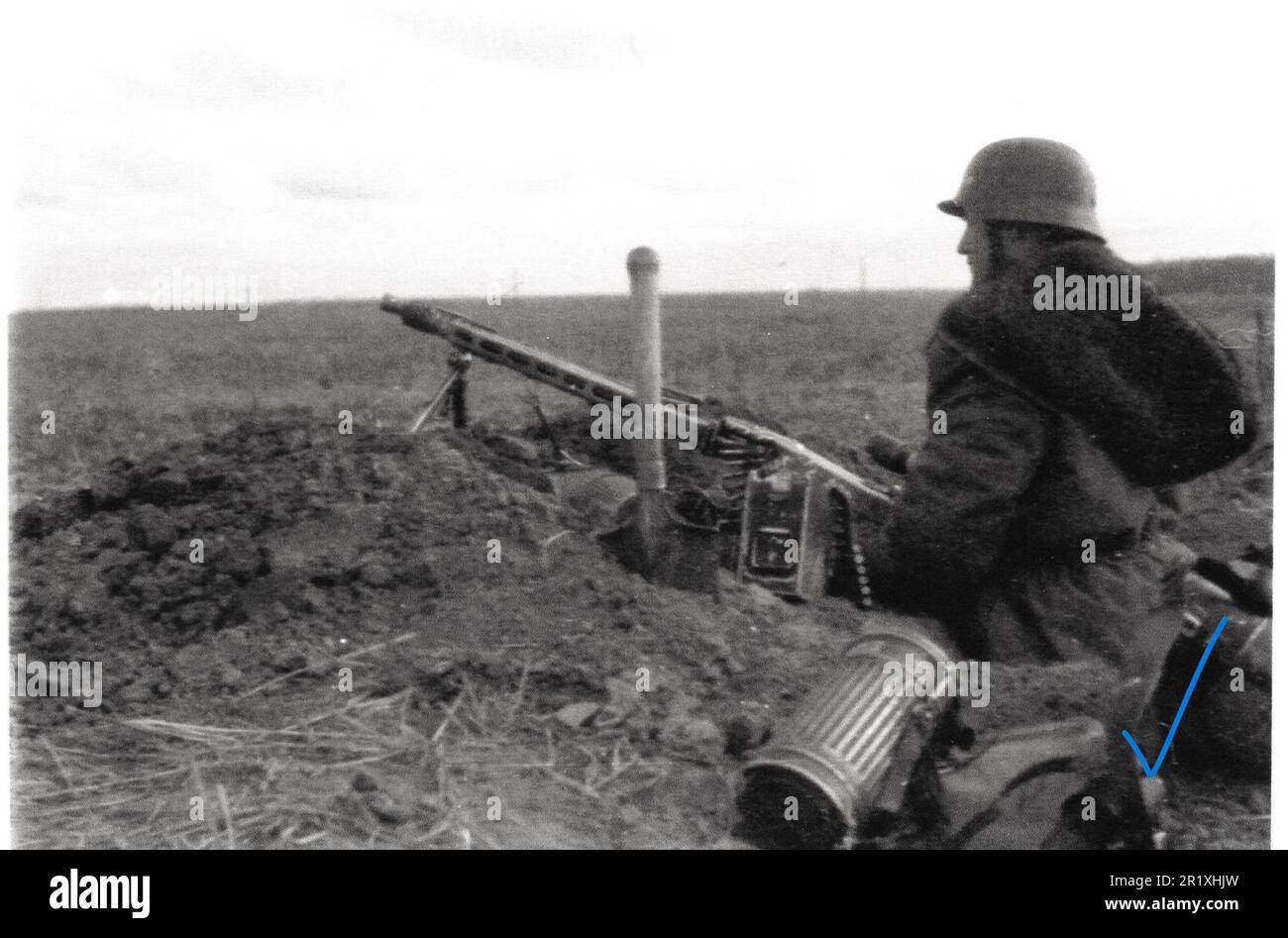 World War Two B&W photo German Soldier in Winter Parka with a MG42 on the Russian Front November 1943.  The man is from the 1st SS Panser Division LAH Stock Photo