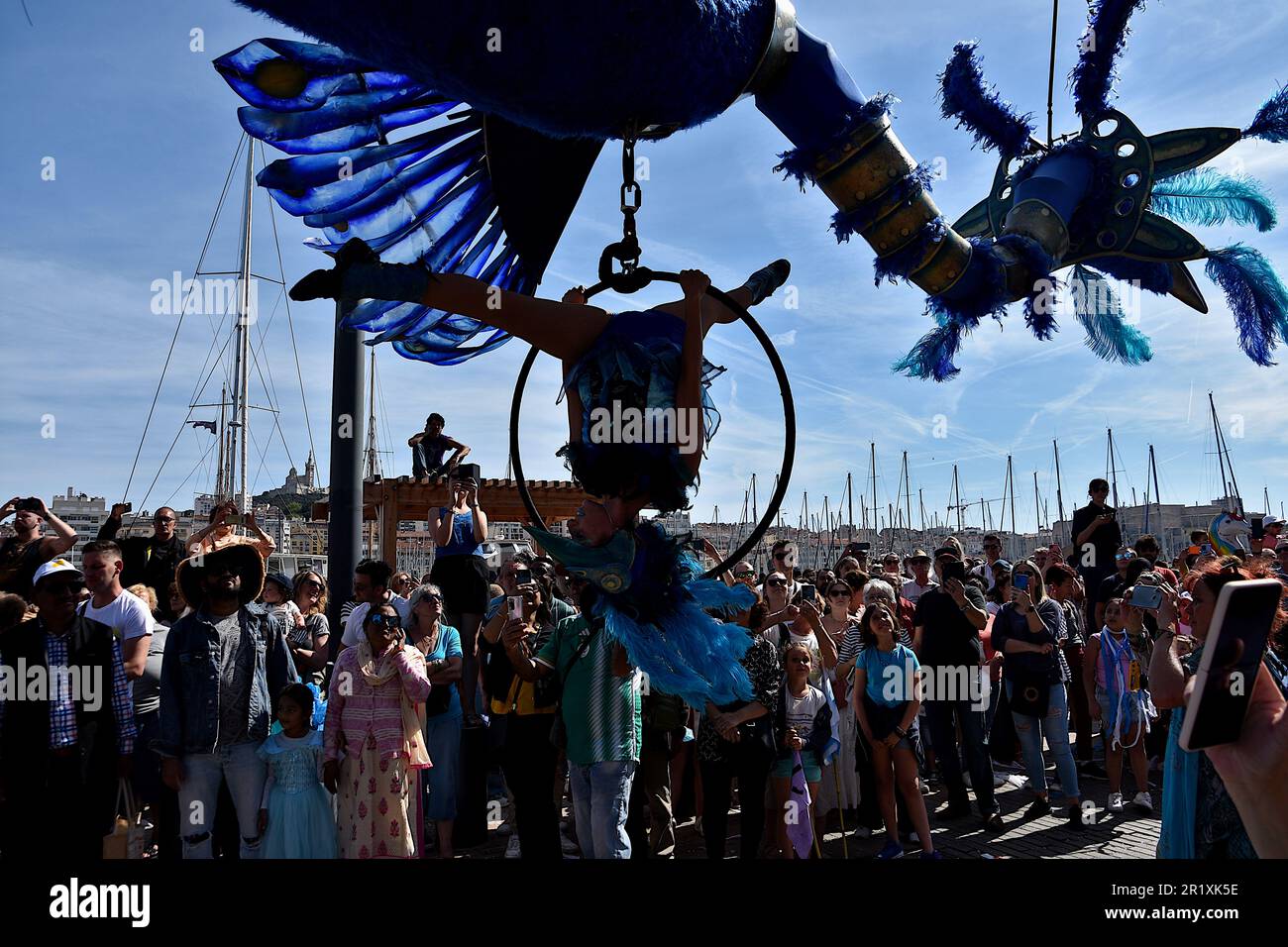 An acrobat performs during the carnival. The parade of The Marseille