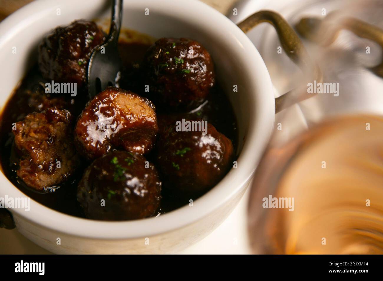 Homemade meat balls with wine sauce in a restaurant in Spain Stock