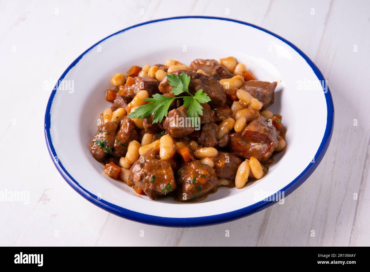 Beef stew with white beans. Traditional spanish tapa Stock Photo Alamy