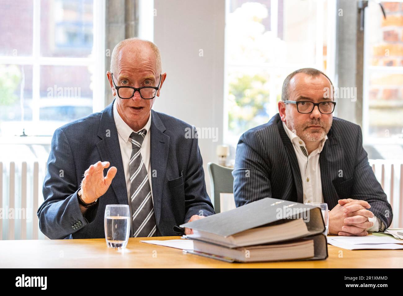 Paul Crawford (left), sits alongside Queens University Belfast