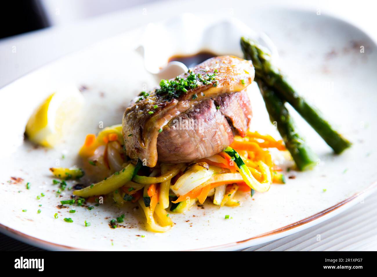 Beef tenderloin cooked at low temperature served with grilled foie