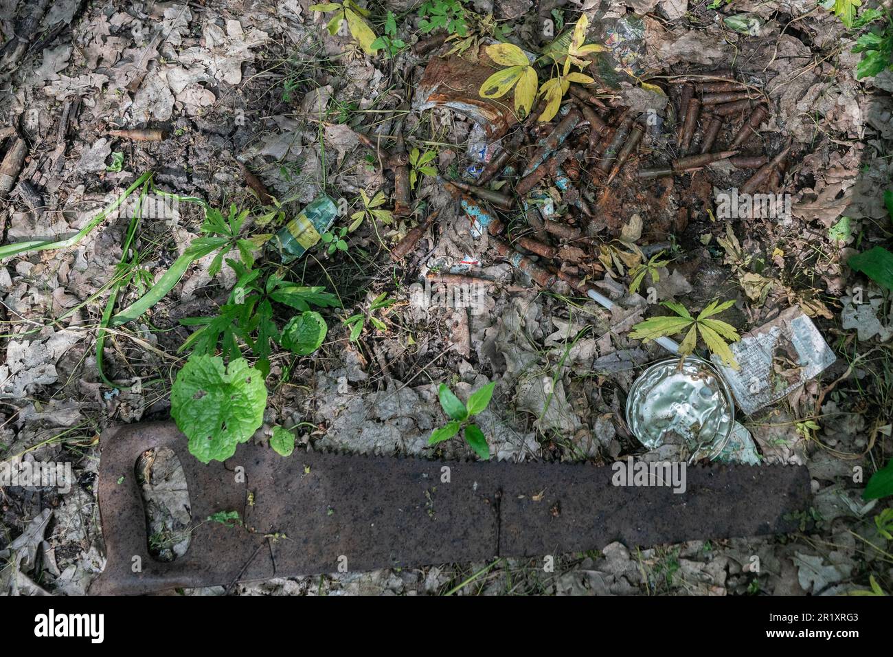 https://c8.alamy.com/comp/2R1XRG3/usa-15th-may-2023-bullets-and-primitive-saw-left-by-russian-forces-during-occupation-near-village-of-sulyhivka-kharkiv-region-of-ukraine-seen-on-may-15-2023-russian-forces-hasty-retreated-leaving-behind-ammunition-tanks-garbage-shoes-sleeping-bags-and-etc-ukrainian-forces-on-this-location-found-almost-30-tanks-in-good-conditions-they-fixed-and-reuse-against-russian-army-photo-by-lev-radinsipa-usa-credit-sipa-usaalamy-live-news-2R1XRG3.jpg