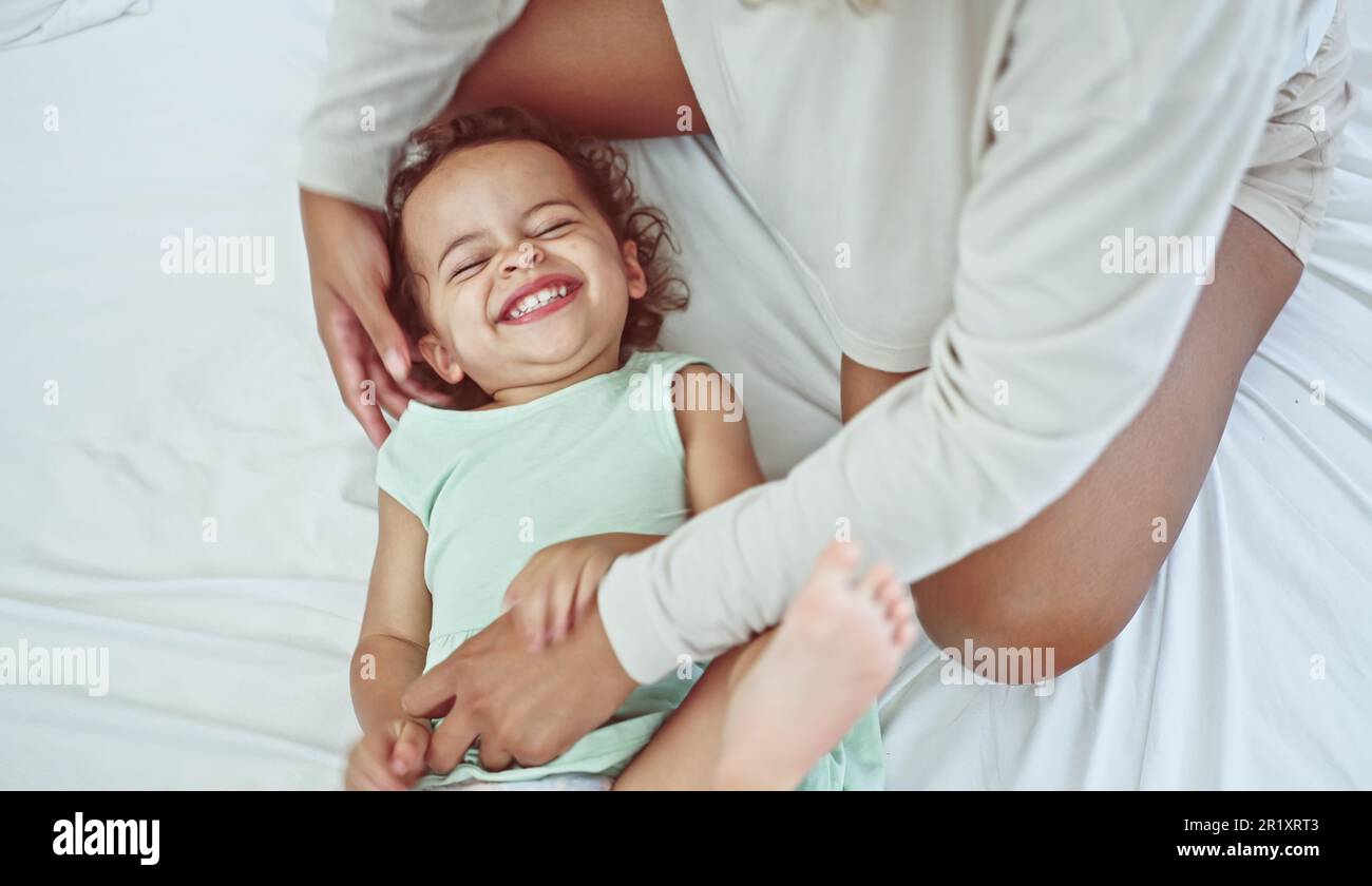 Happy family love, mother and her daughter, her daughter playing and hugging. Stock Photo