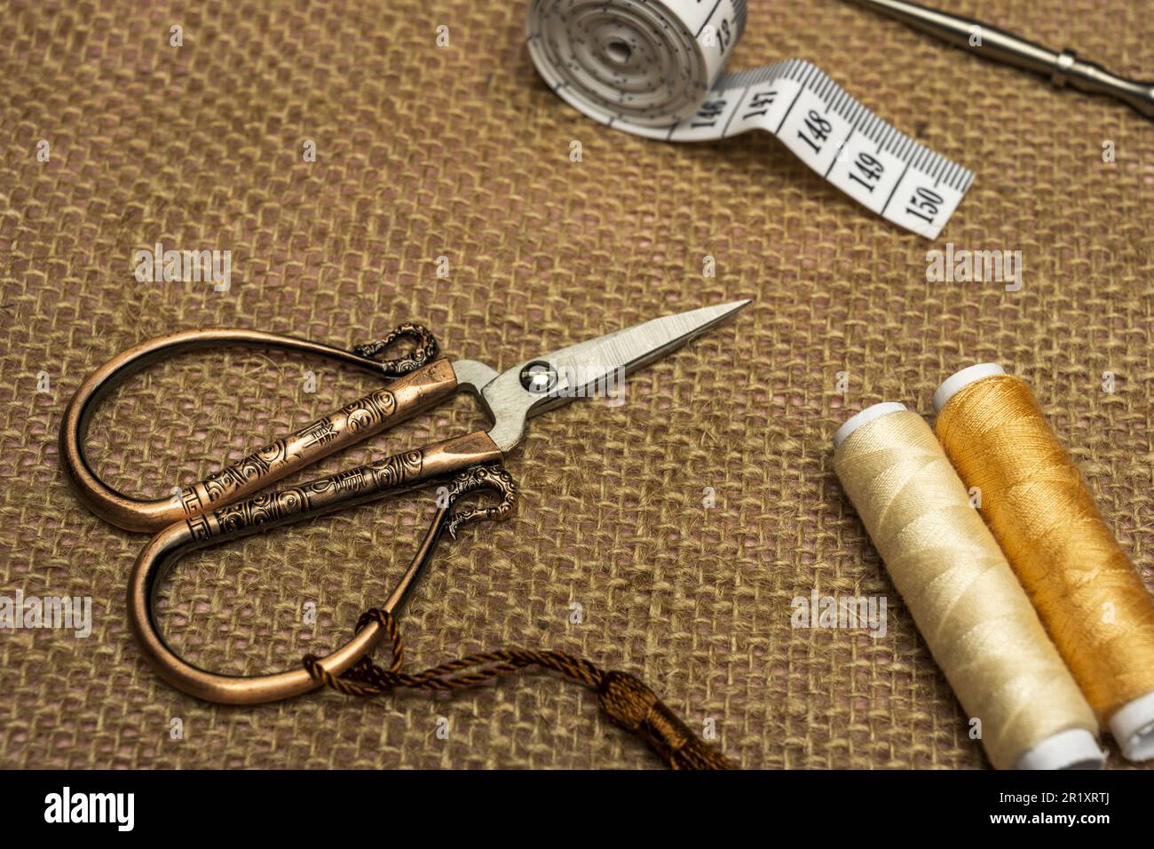 thread sewing needle centimeter scissors on a white background Stock Photo  - Alamy
