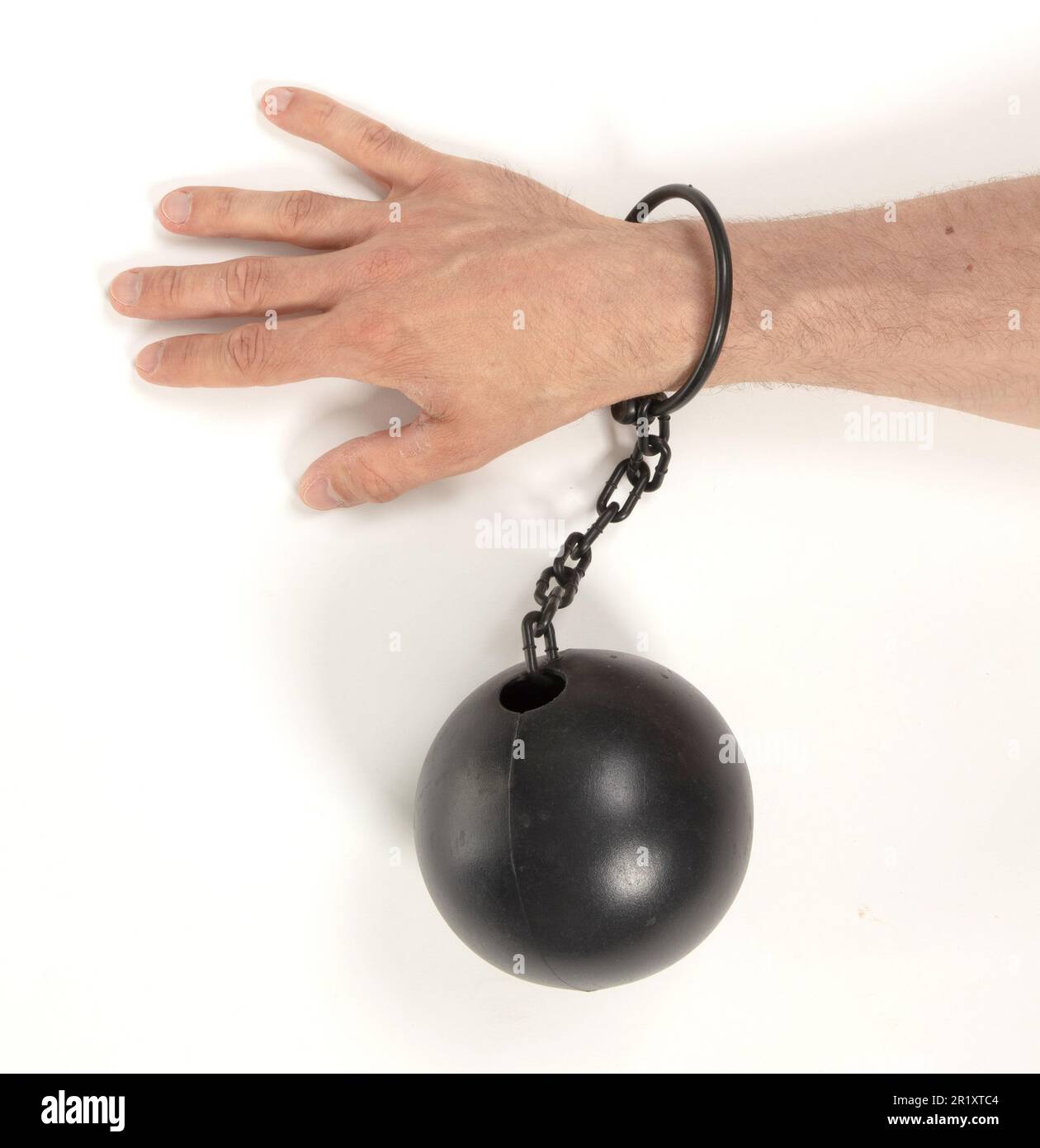Heavy looking ball with cuff chain for prisoners, isolated Stock Photo