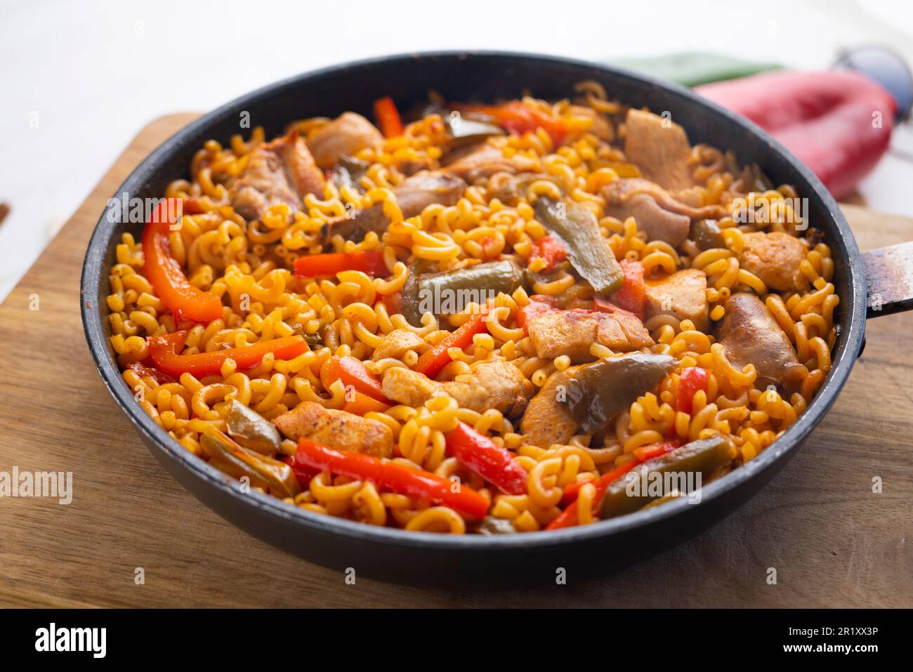 Traditional Spanish fideua. Noodle paella isolated on white background. Top  view Stock Photo - Alamy