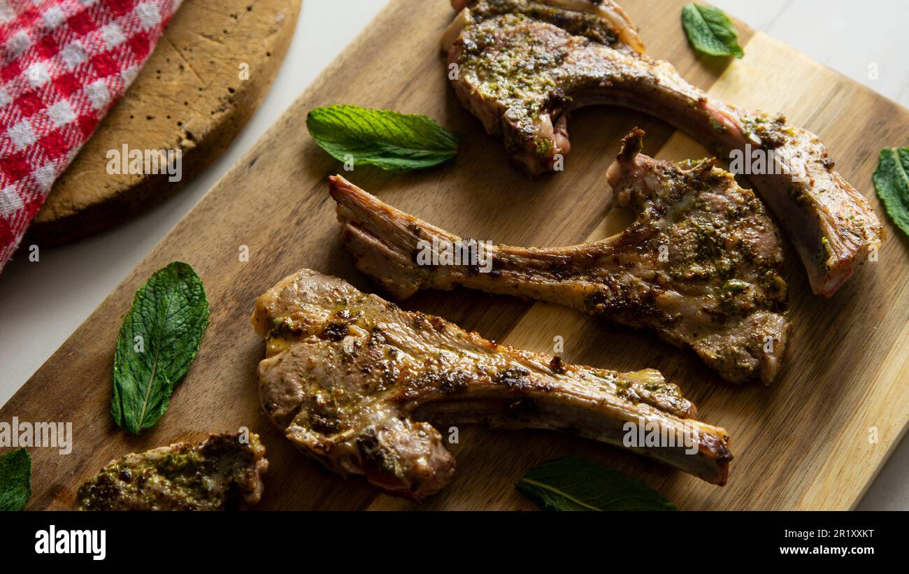 Lamb chops braised and marinated with mint Stock Photo Alamy