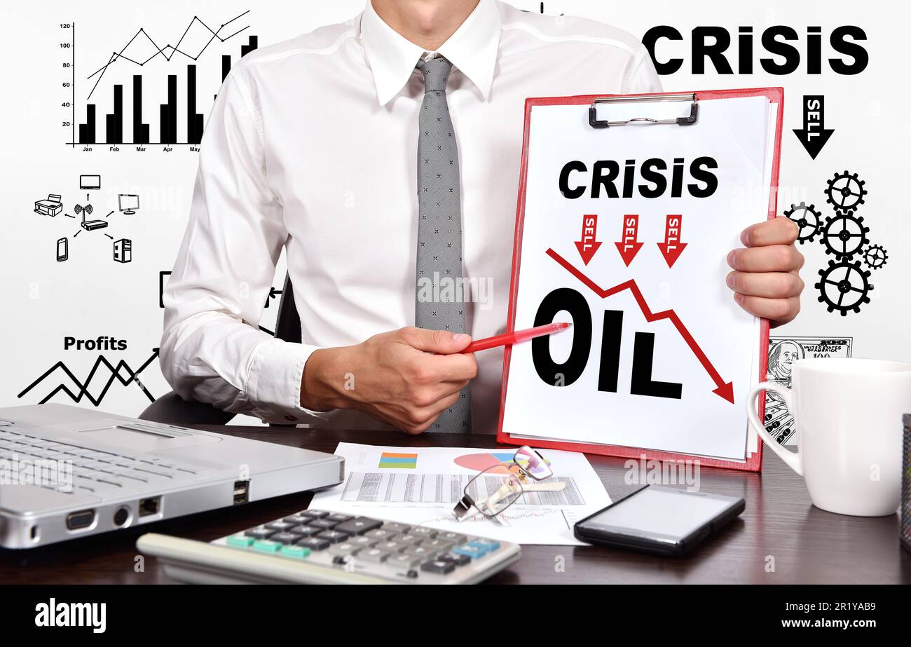 businessman in office holaing clipboard with drawing crisis oil chart