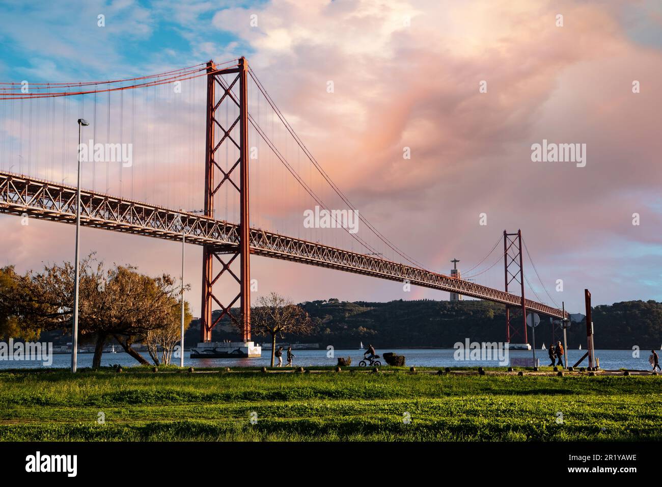 Sunset on the 25th of April bridge in Lisbon Stock Photo