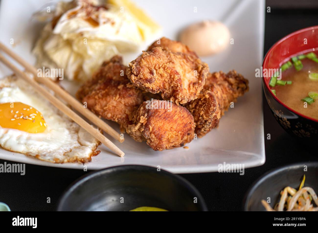 Traditional Japanese deep fried in oil Chicken Karaage on a plate at a