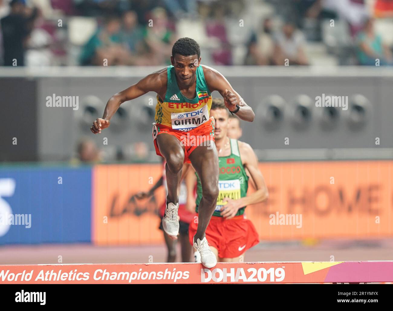 Lamecha Girma participating in the 3000 meter steeplechase at the Doha