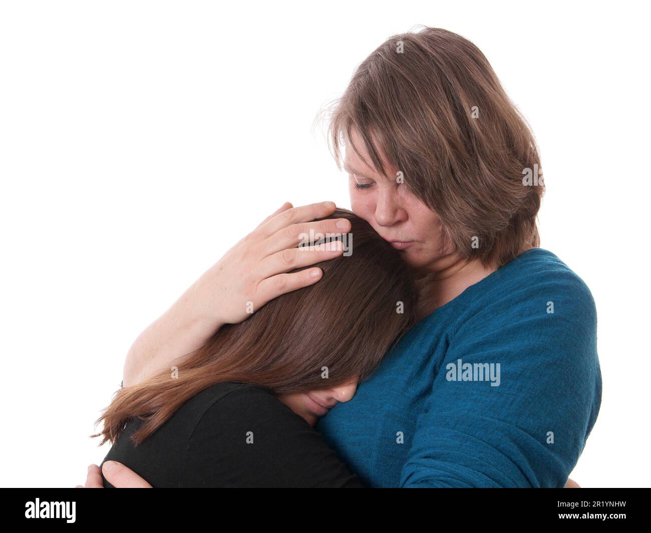 Mother comforts her daughter Stock Photo