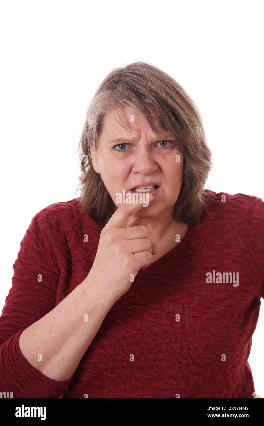 Older woman looks confused Stock Photo