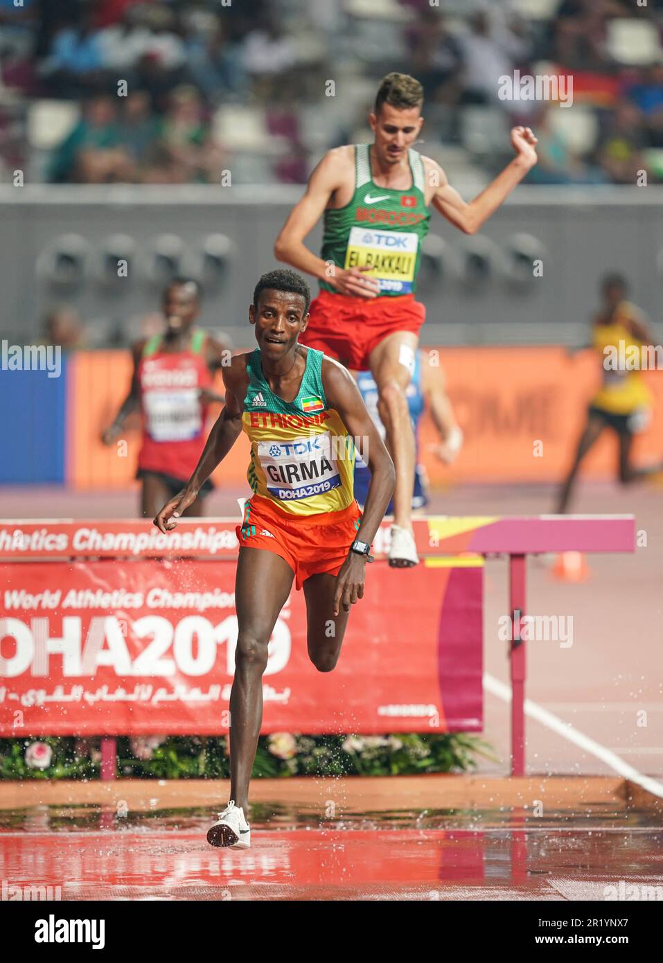 Lamecha Girma participating in the 3000 meter steeplechase at the Doha