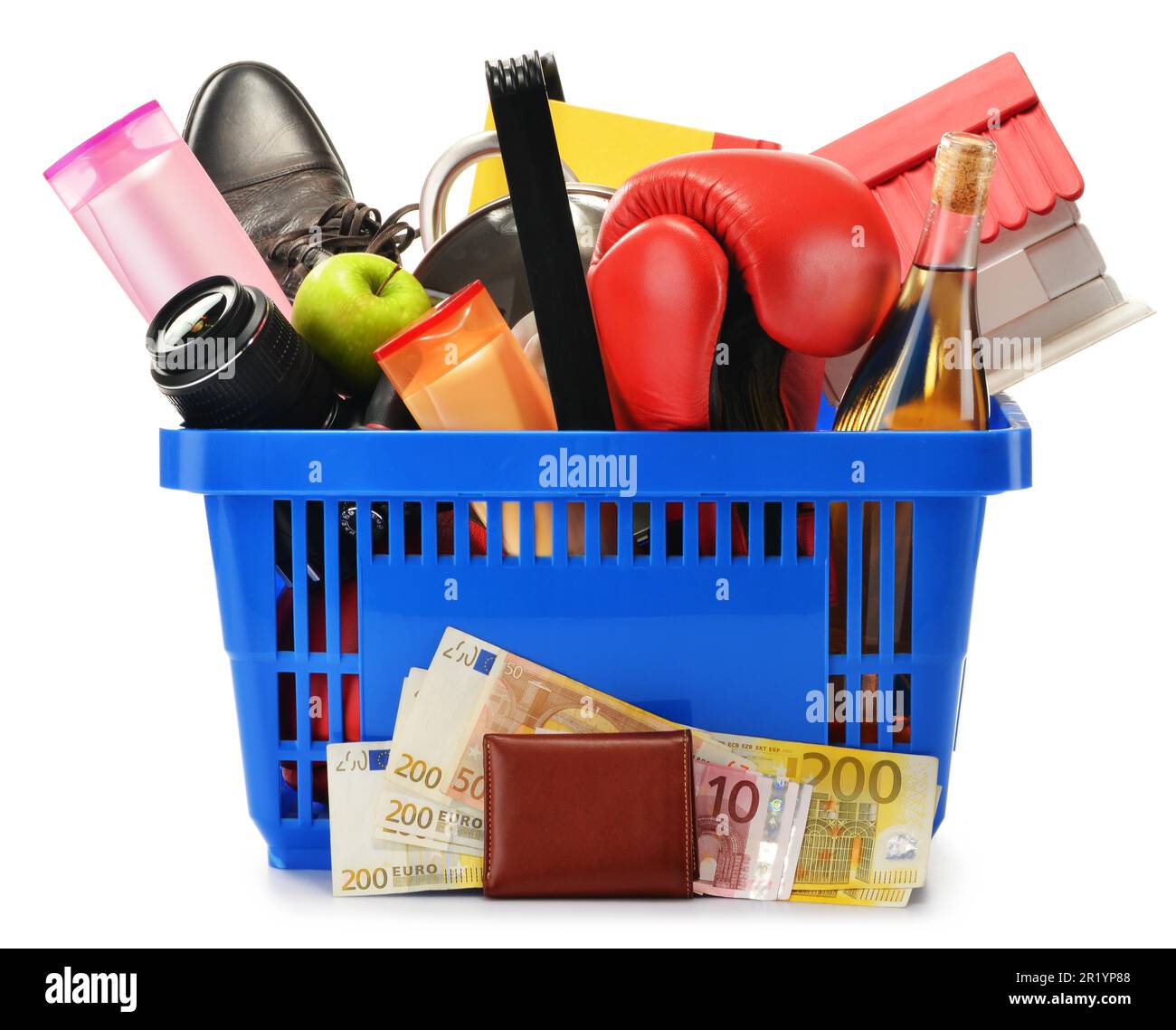 Variety of consumer products in plastic shopping basket isolated on white Stock Photo