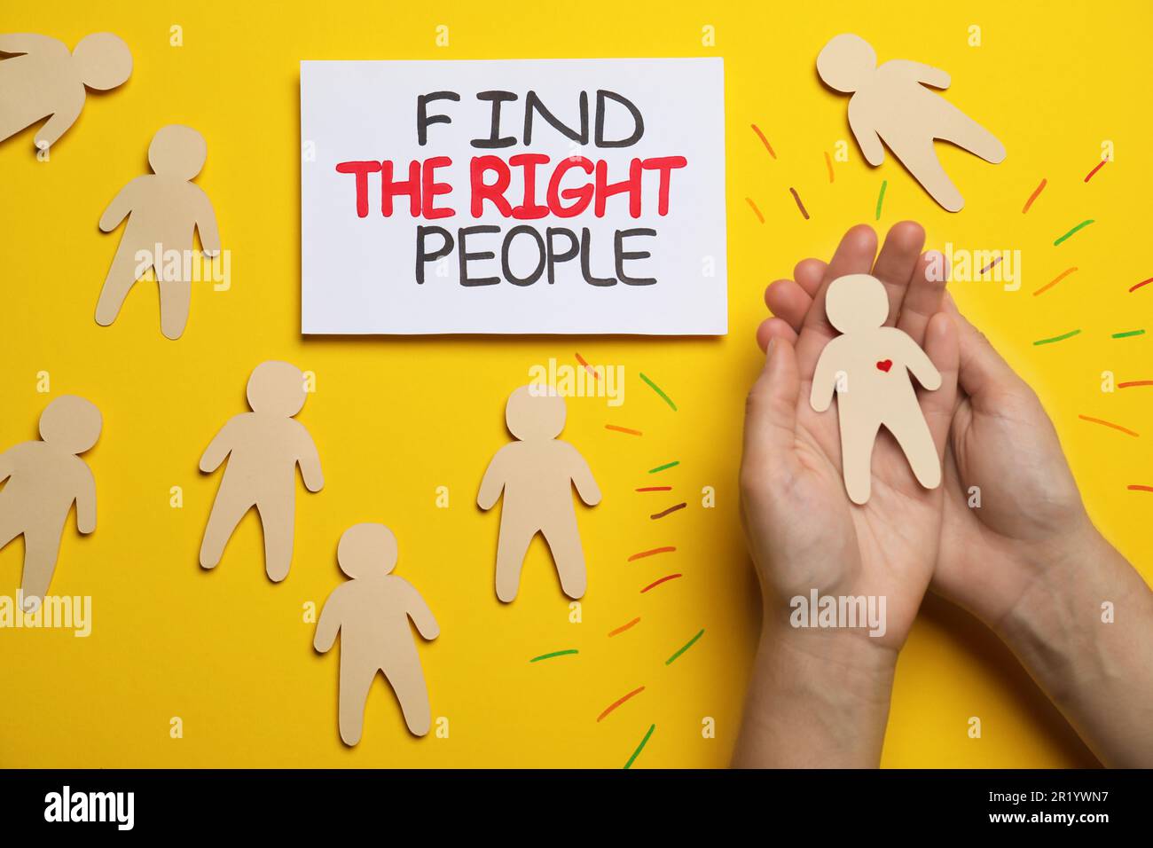 Find the right people. Woman choosing human paper figure with drawn ...