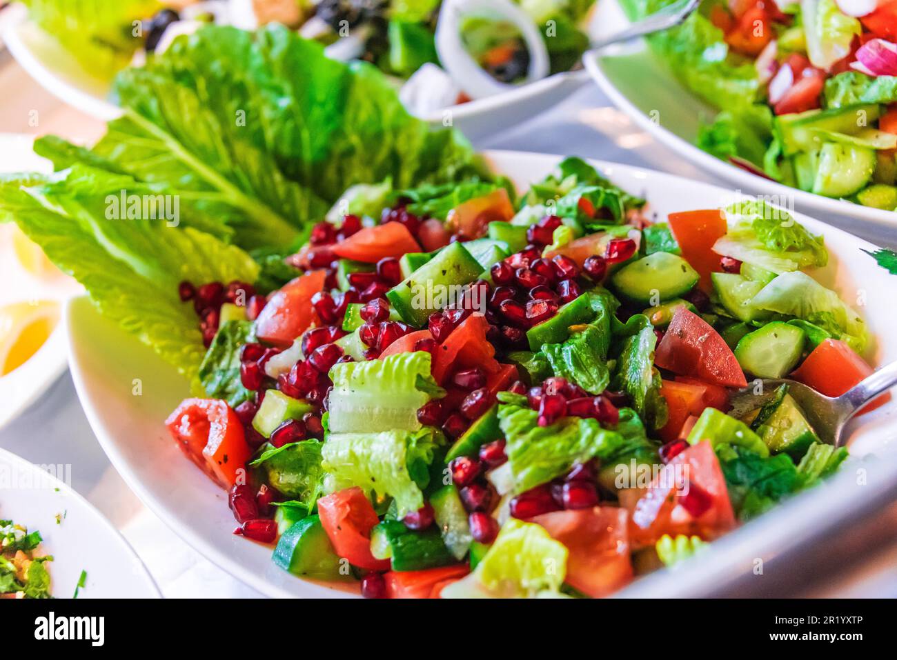 Assortment of fresh vegetable salads in restaurant buffet Stock Photo