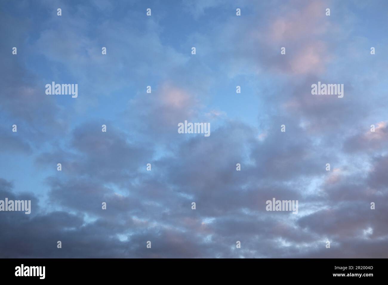 Beautiful blue sky with many dark clouds. Stormy weather Stock Photo ...