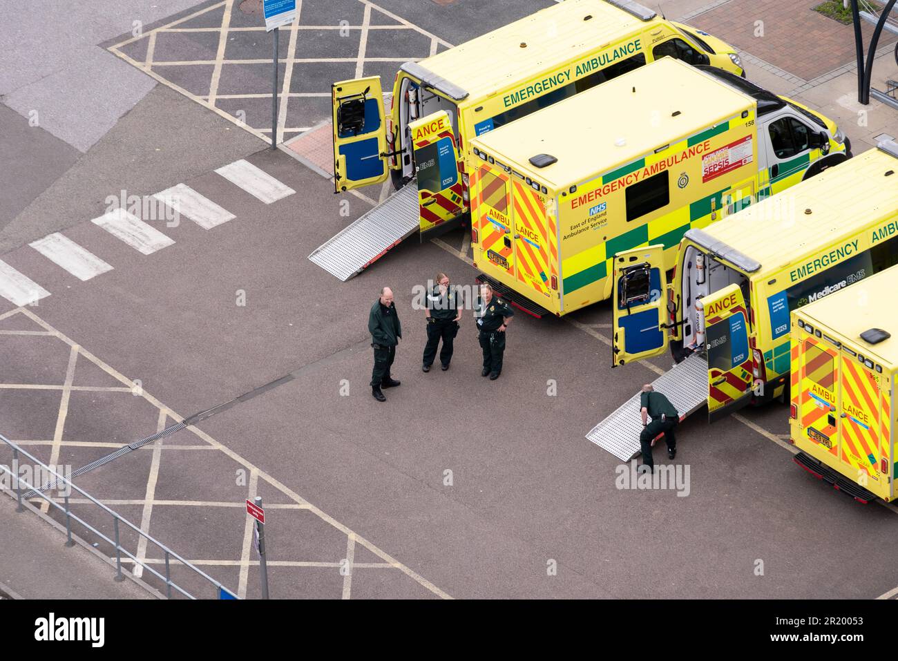 Ambulances outside Southend hospital viewed from above. Paramedics. East of England Ambulance Service, NHS, National Health Service vehicles Stock Photo