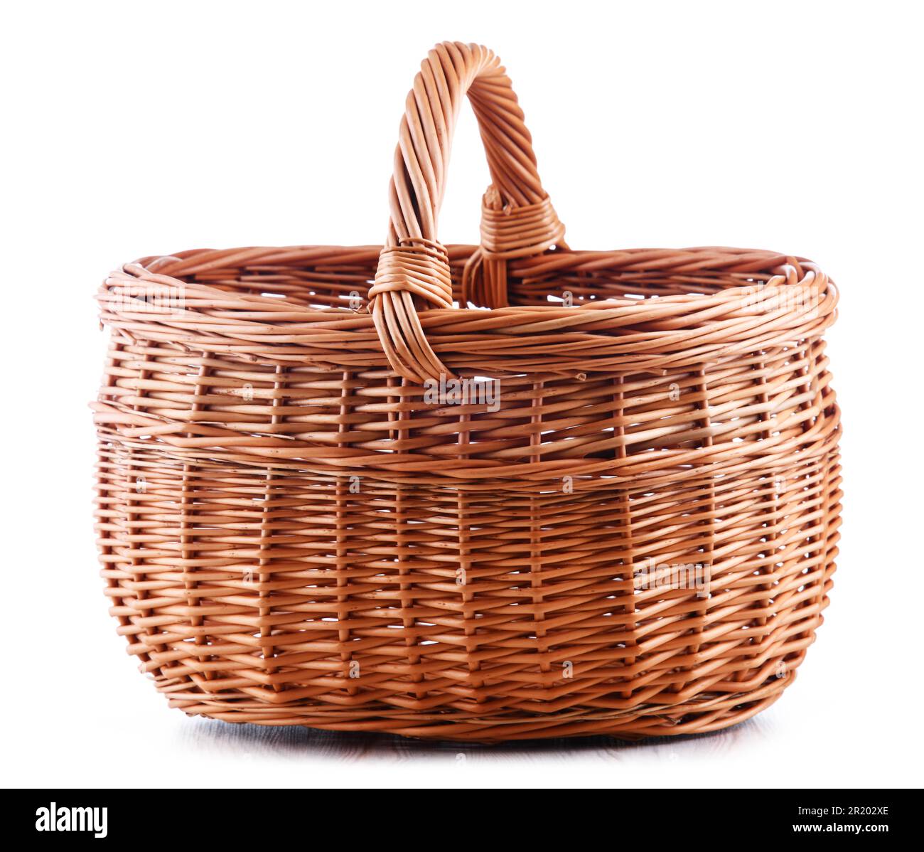 Empty wicker basket isolated on white background Stock Photo