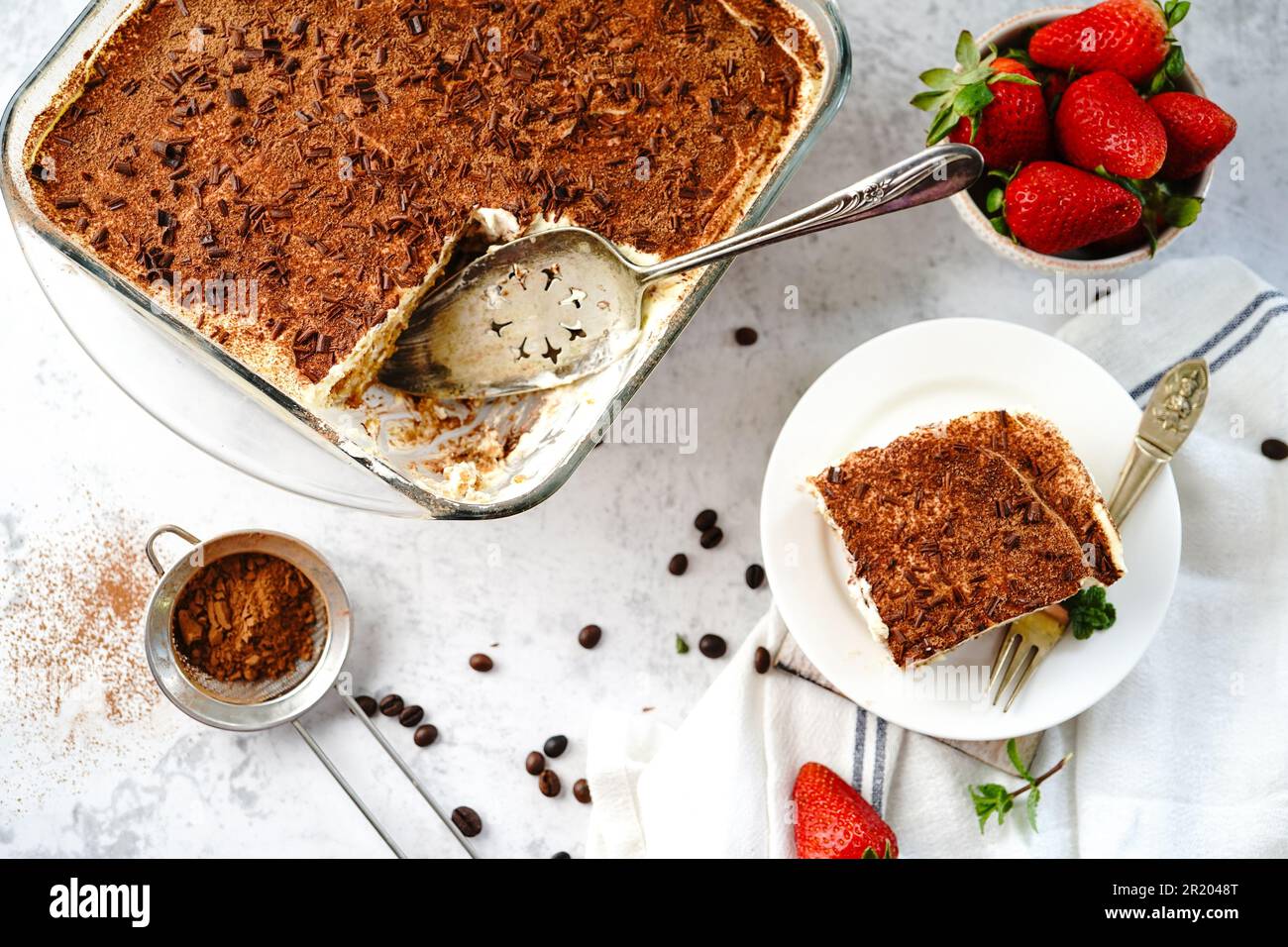 Homemade Tiramisu with ladyfingers base italian dessrtm selective