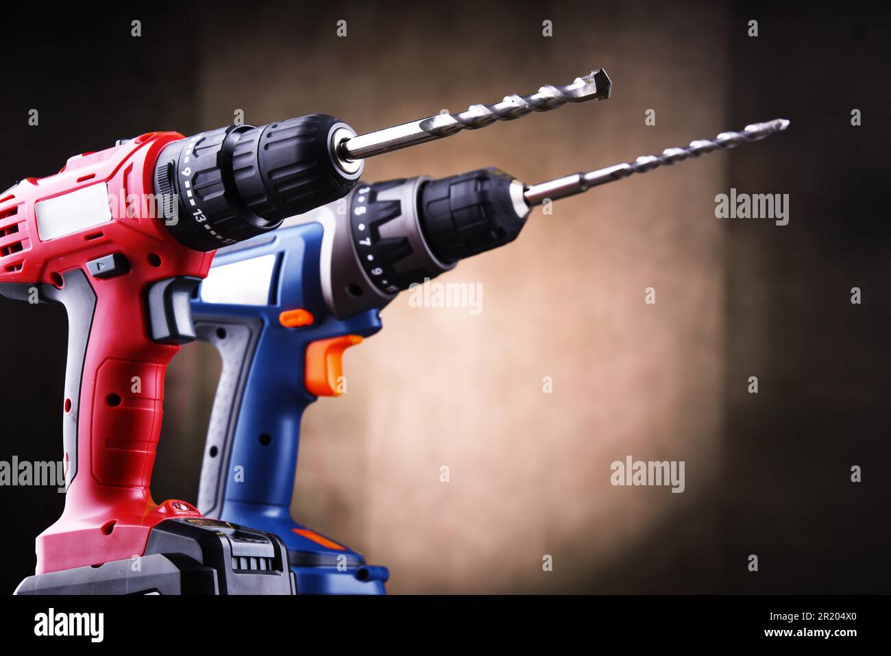 Composition with two cordless drills also working as screw guns Stock Photo