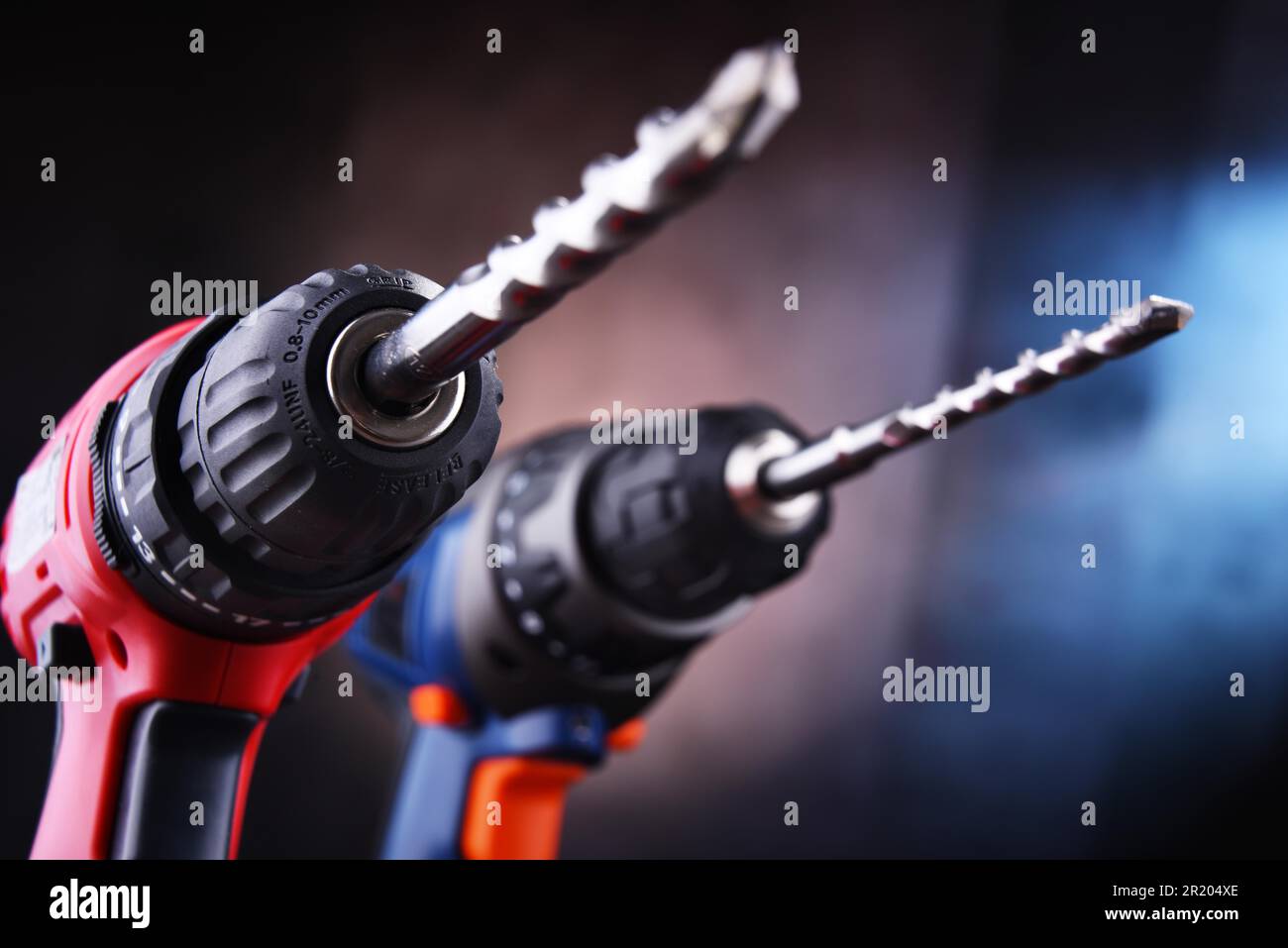 Composition with two cordless drills also working as screw guns Stock Photo
