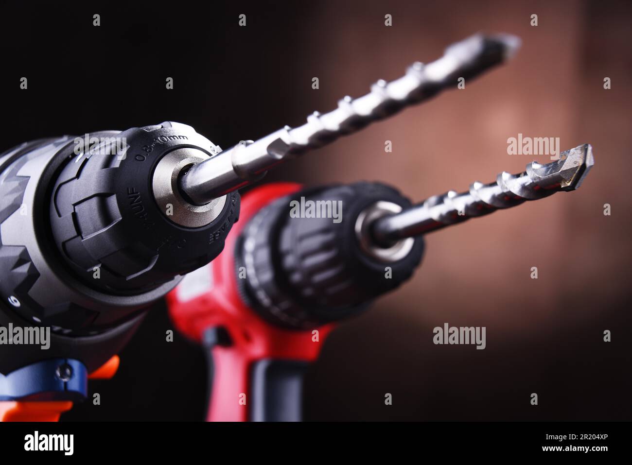 Composition with two cordless drills also working as screw guns Stock Photo