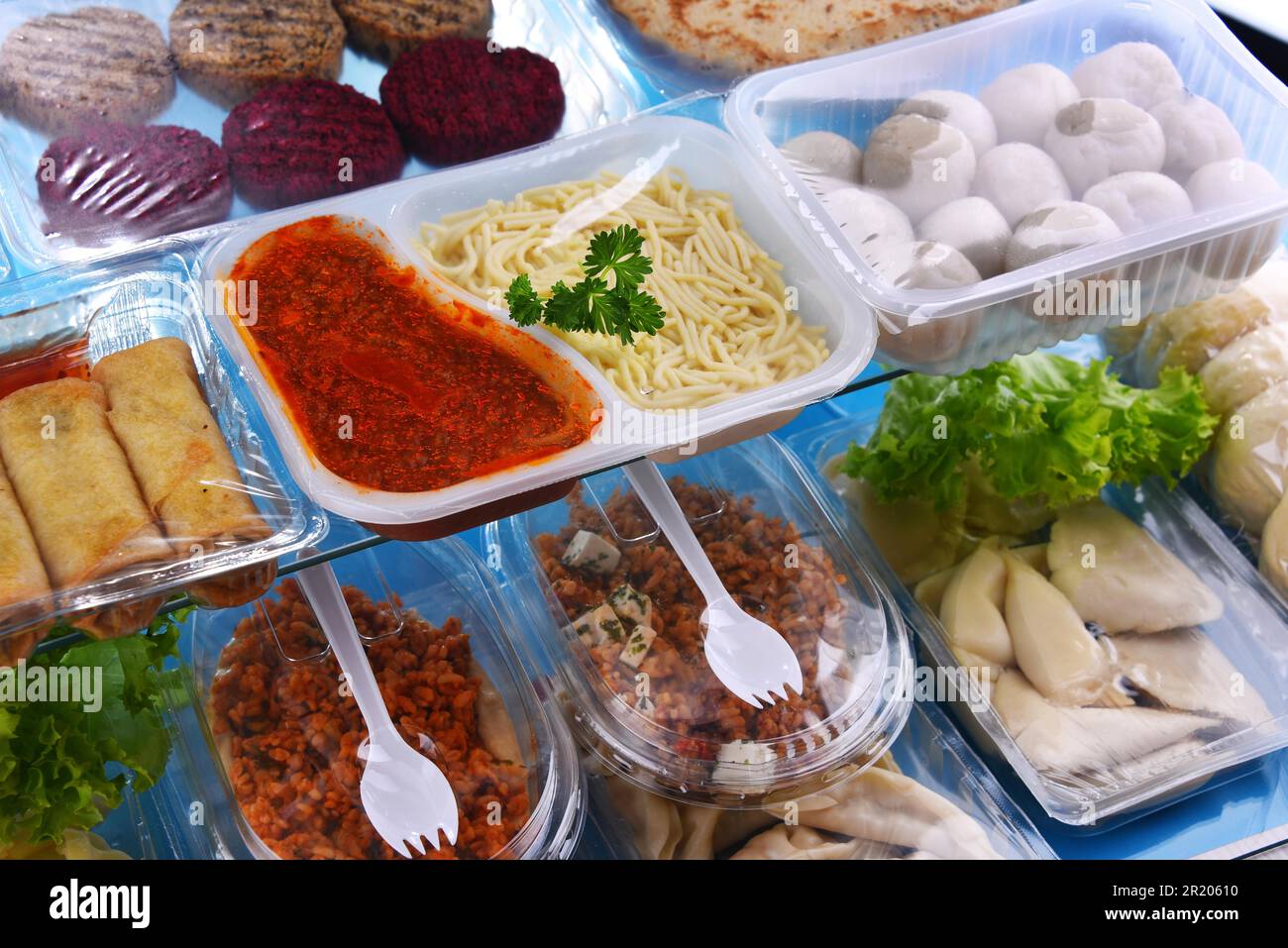 A variety of prepackaged food products in plastic boxes Stock Photo