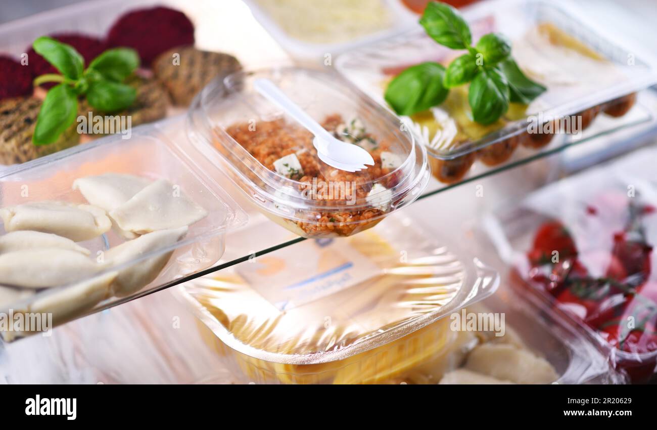 A variety of prepackaged food products in plastic boxes Stock Photo
