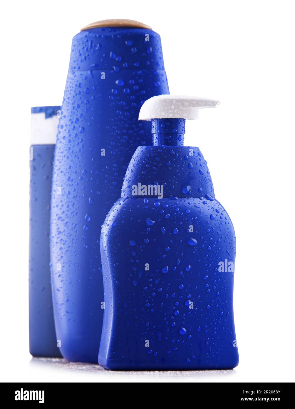 Plastic contaiers of shampoos and shower gels isolated on white