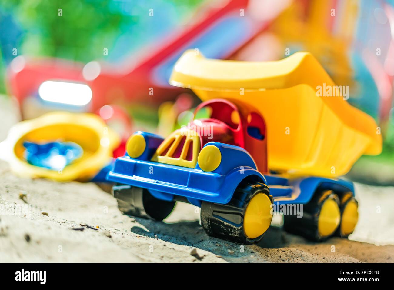 Colorful plastic children toys on the playground Stock Photo