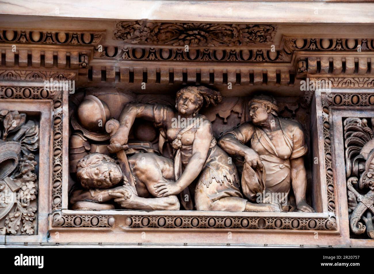 Marble relief cautionary tale of Judith beheading Holofernes, Cathedral of Milan, Italy. Stock Photo